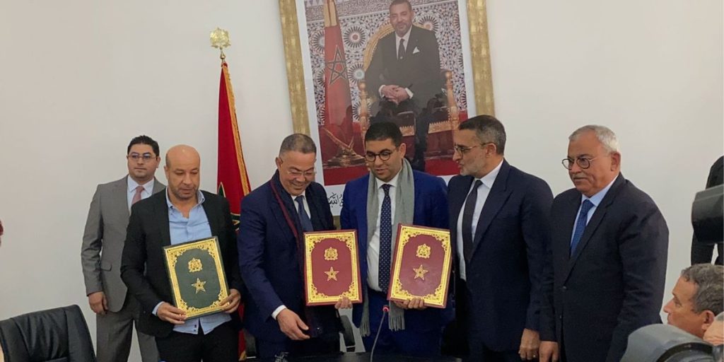 اتفاقية شراكة تجمع اللجنة الوطنية الأولمبية المغربية وجامعة كرة القدم وجمعية الإعلام والناشرين
