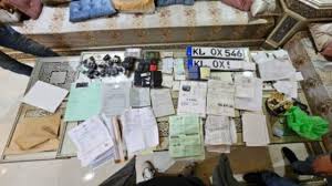 توقيف 22 شخصا وذلك للاشتباه في ارتباطهم بشبكة إجرامية تنشط في التزوير واستعماله في وثائق تسجيل السيارات